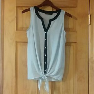 Sleeveless polka dot button up blouse